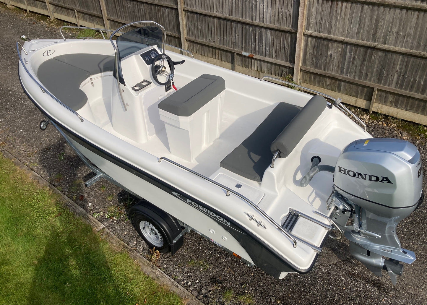 Poseidon Blu Water 170 + Honda Outboard