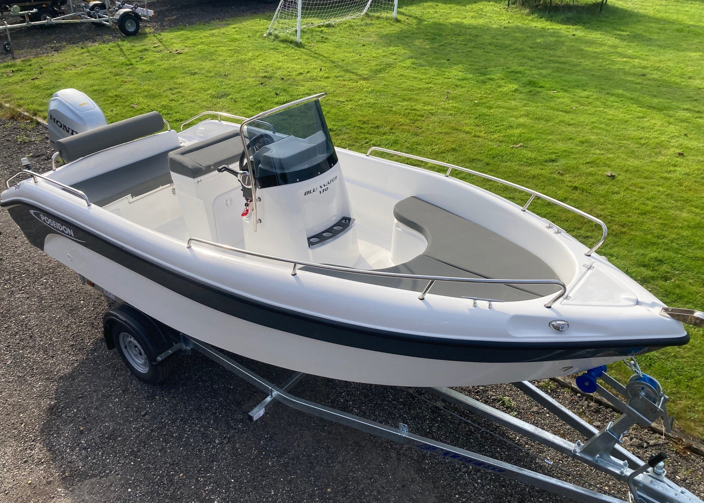 Poseidon Blu Water 170 + Honda Outboard
