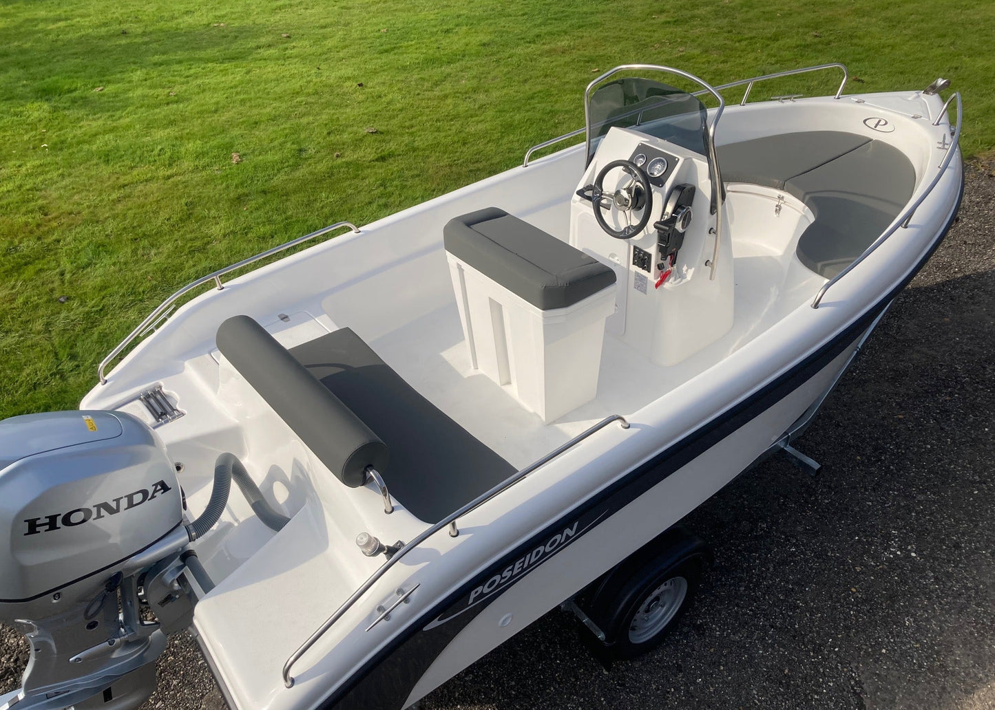 Poseidon Blu Water 170 + Honda Outboard