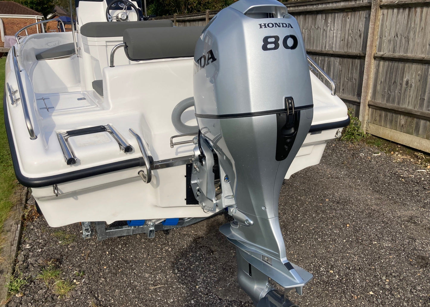 Poseidon Blu Water 170 + Honda Outboard