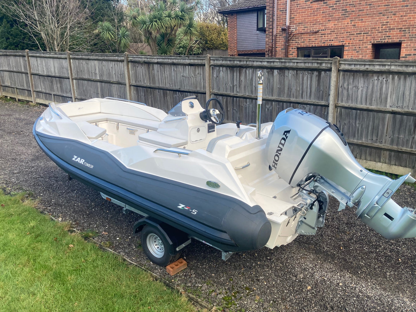 ZAR Tender ZF-5 + Honda BF100 + Road Trailer