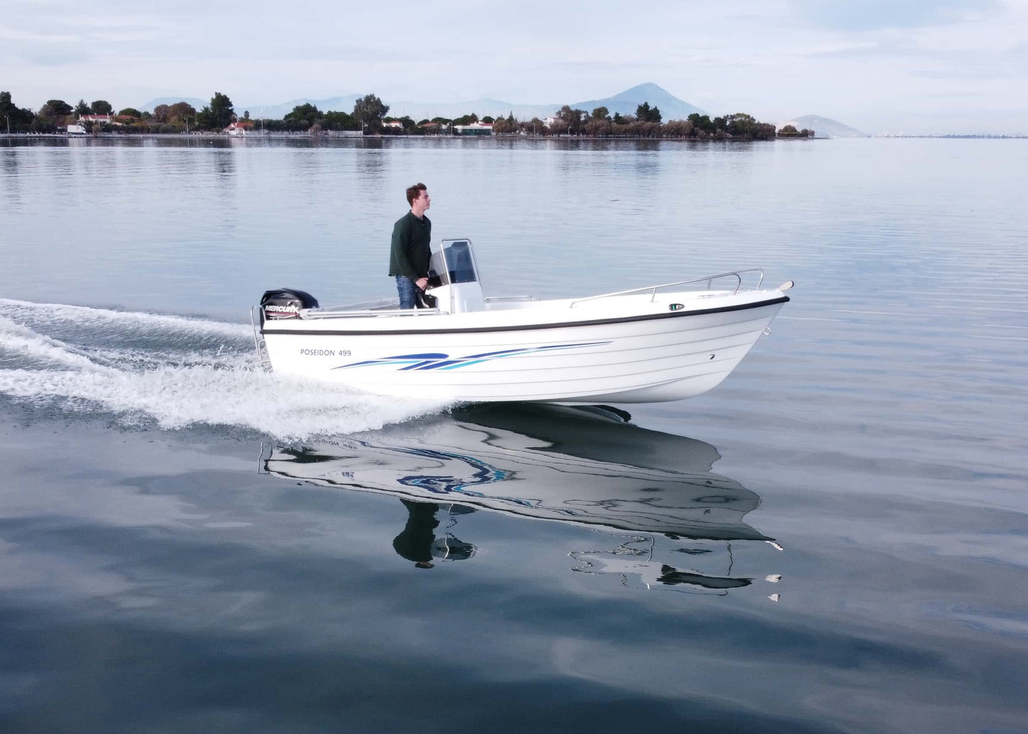 Poseidon Fish 510 T + Honda Outboard