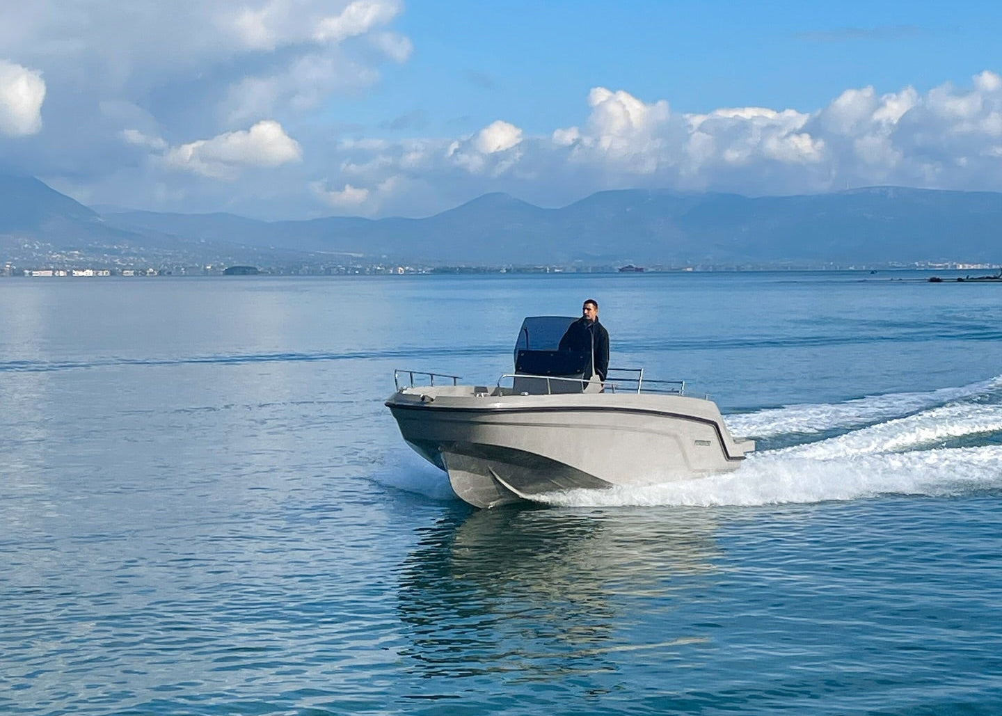 Poseidon Blu Water 210 + Honda Outboard