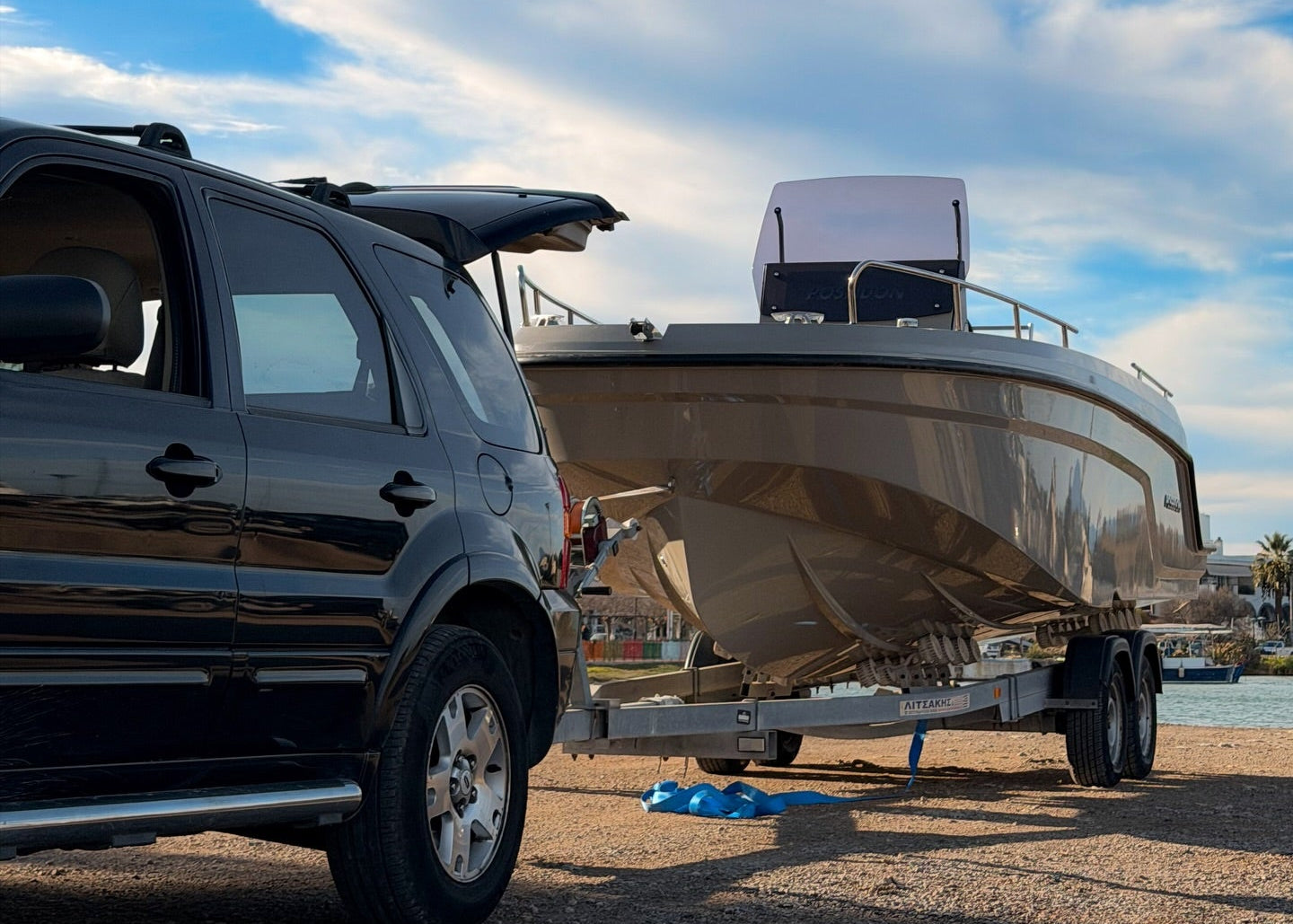 Poseidon Blu Water 210 + Honda Outboard