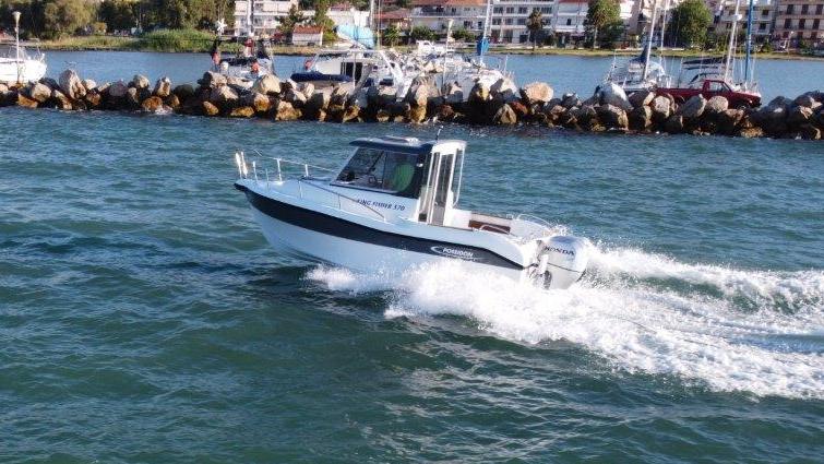 Poseidon King Fisher 570 + Honda Outboard