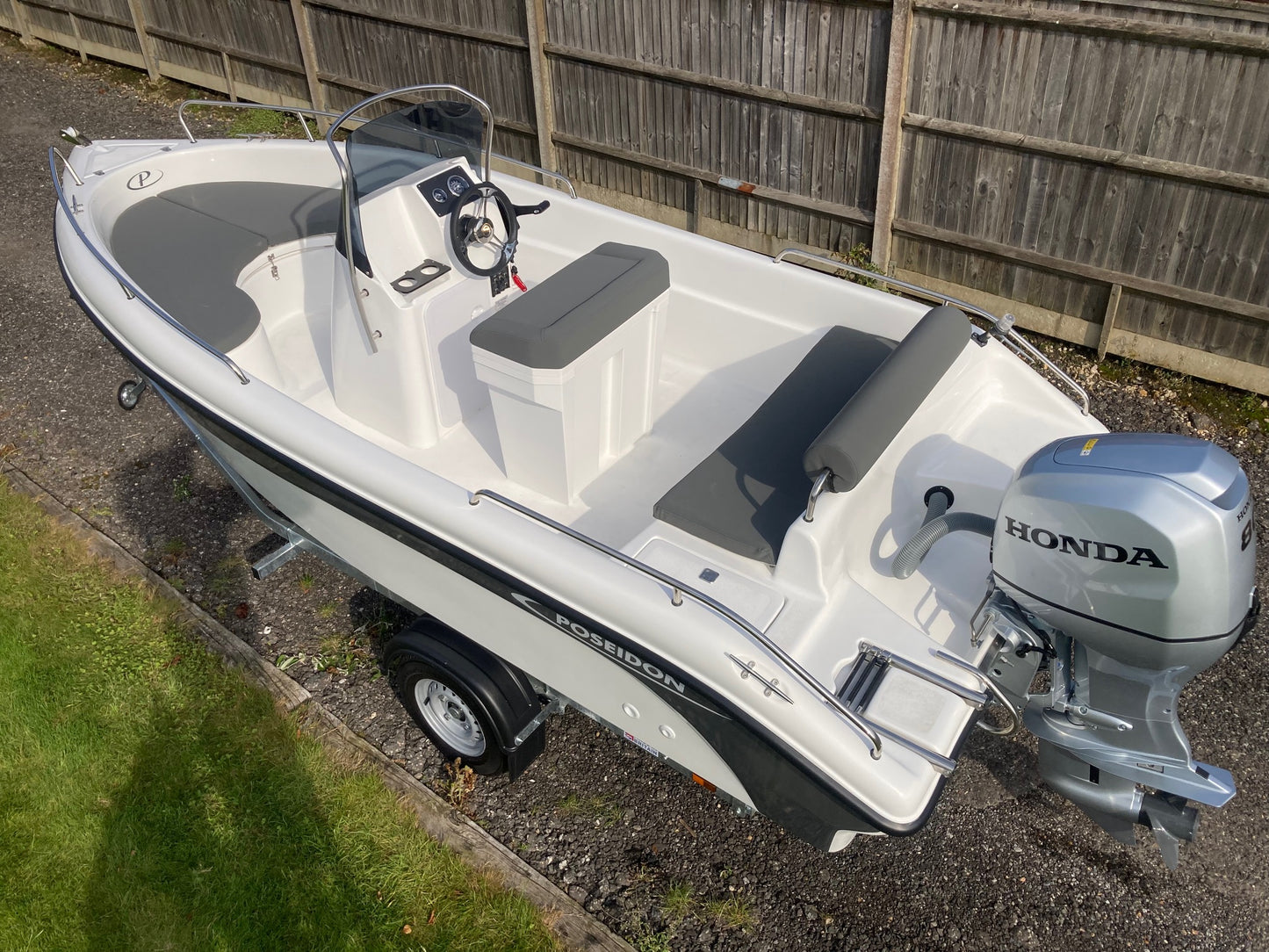 Poseidon Blu Water 170 + Honda Outboard + Road Trailer