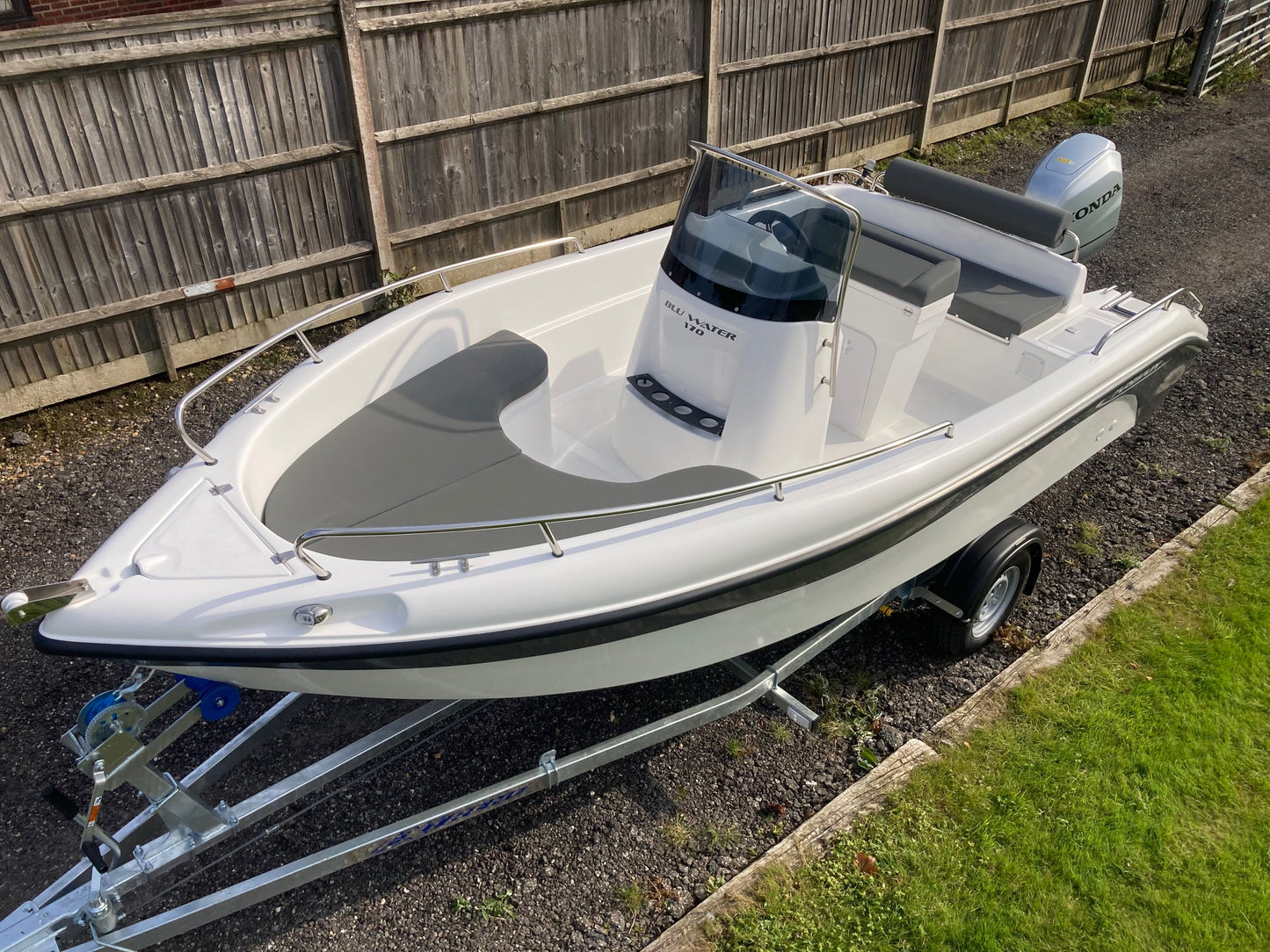 Poseidon Blu Water 170 + Honda Outboard + Road Trailer