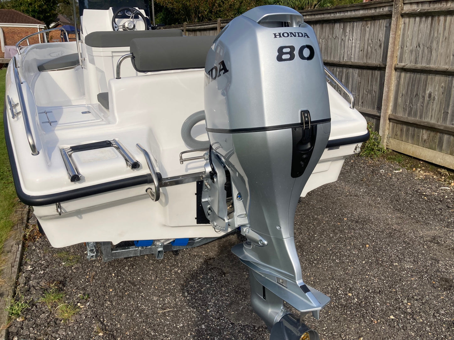 Poseidon Blu Water 170 + Honda Outboard + Road Trailer